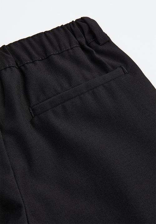 H&M - Loose fit tailored trousers - black