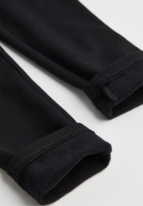 H&M - Leggings with brushed inside - black/pleat