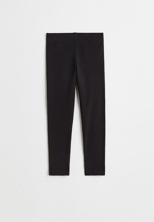 H&M - Leggings with brushed inside - black/pleat