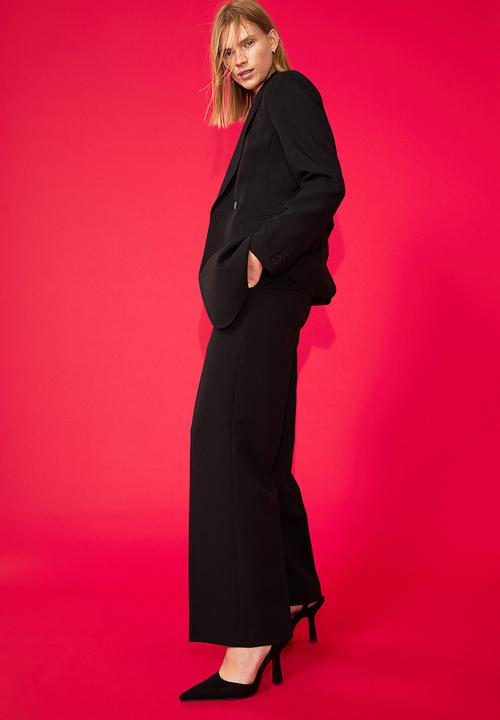 H&M - Straight trousers - black