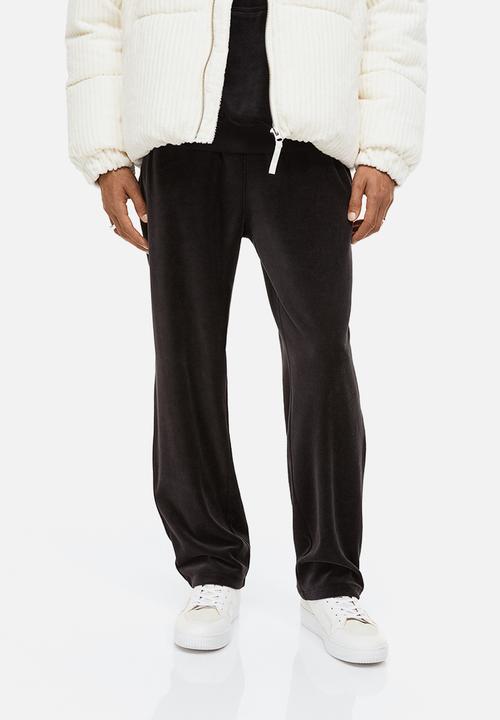 H&M - Relaxed fit velour joggers - black