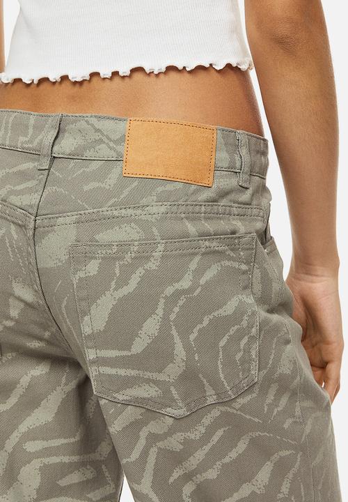 H&M - Wide twill trousers - khaki green/patterned 