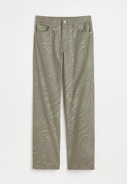 H&M - Wide twill trousers - khaki green/patterned 