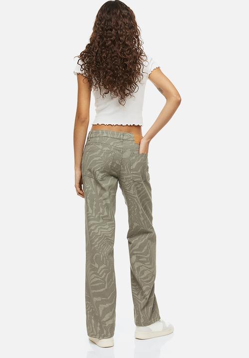 H&M - Wide twill trousers - khaki green/patterned 
