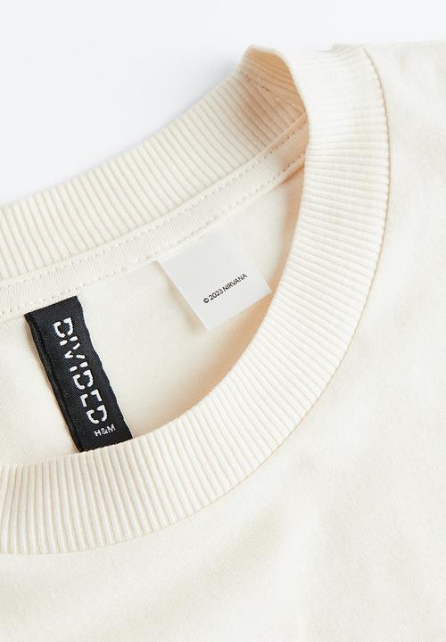H&M - Oversized printed T-shirt - cream/nirvana