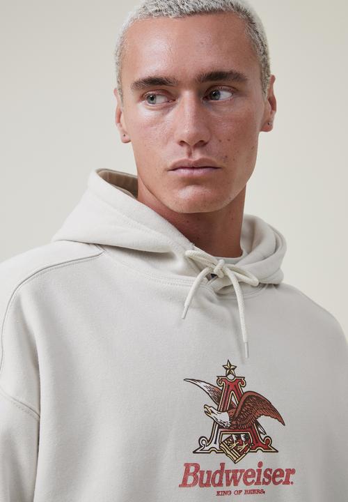 Cotton On - Budweiser oversized fleece hoodie - lcn bud ivory/a & eagle 