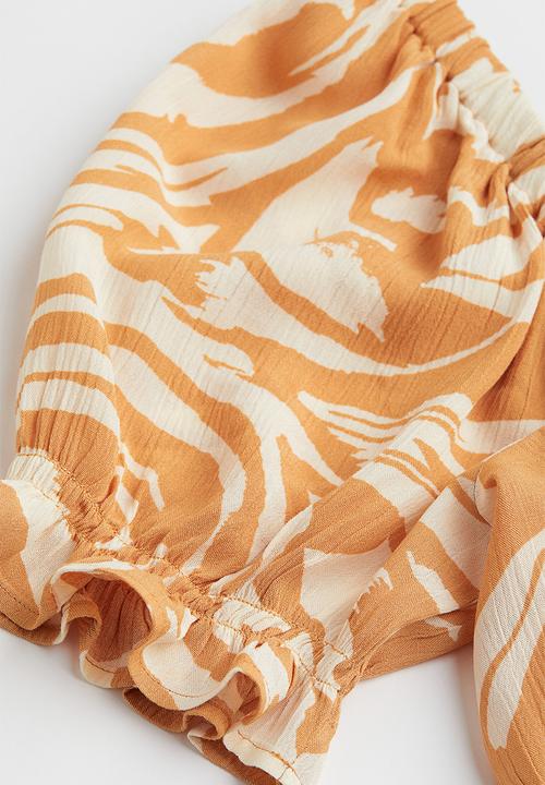 H&M - Puff-sleeved crêpe blouse - yellow/zebra print