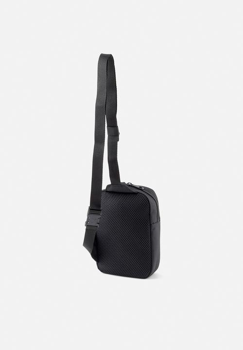 PUMA - Downtown front loader - puma black