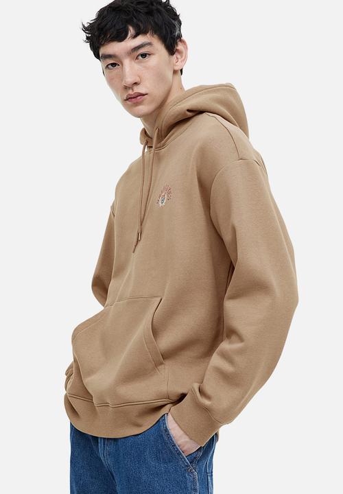 H&M - Relaxed fit printed hoodie - dark beige/graduates