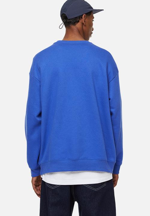 H&M - Relaxed fit sweatshirt - bright blue/graduated