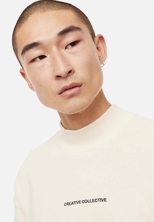 H&M - Relaxed fit sweatshirt - cream/creative collective