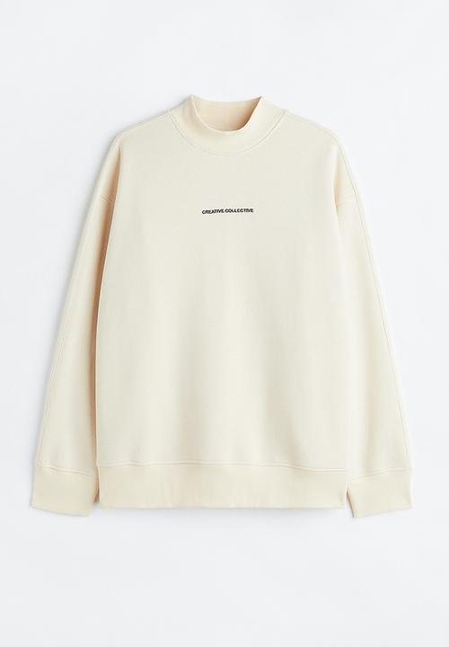 H&M - Relaxed fit sweatshirt - cream/creative collective