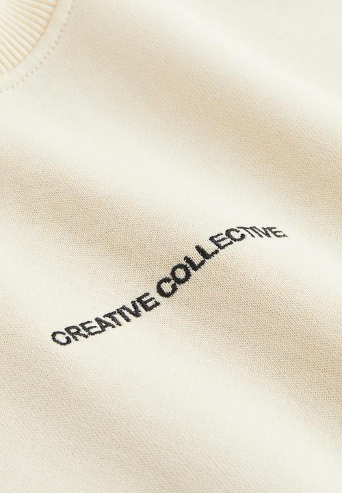 H&M - Relaxed fit sweatshirt - cream/creative collective