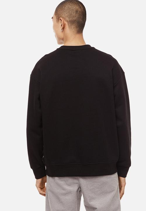 H&M - Relaxed fit appliquéd sweatshirt - black