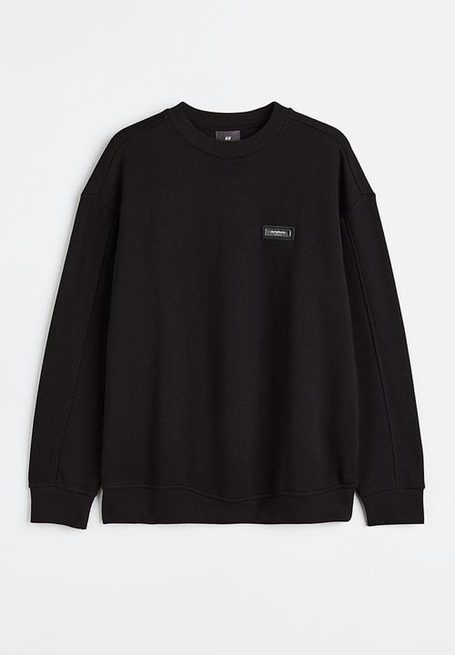 H&M - Relaxed fit appliquéd sweatshirt - black