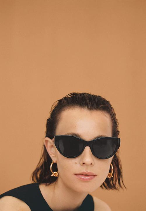 MANGO - Intertwined hoop earrings - gold