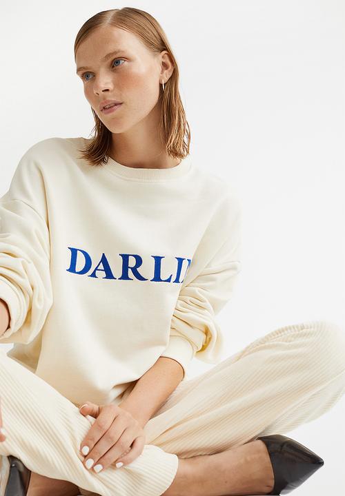 H&M - Embroidered sweatshirt - cream/darlin'