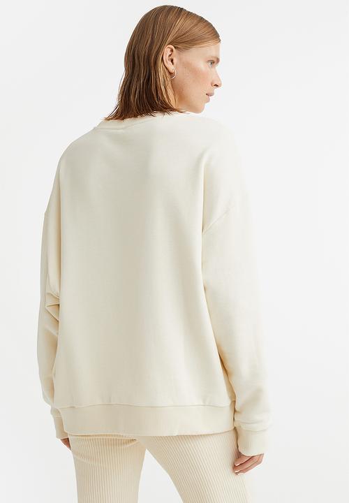 H&M - Embroidered sweatshirt - cream/darlin'