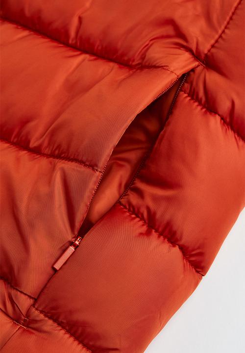 H&M - Padded lightweight gilet - rust orange 