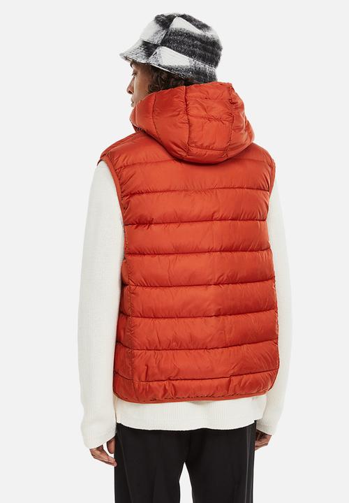 H&M - Padded lightweight gilet - rust orange 