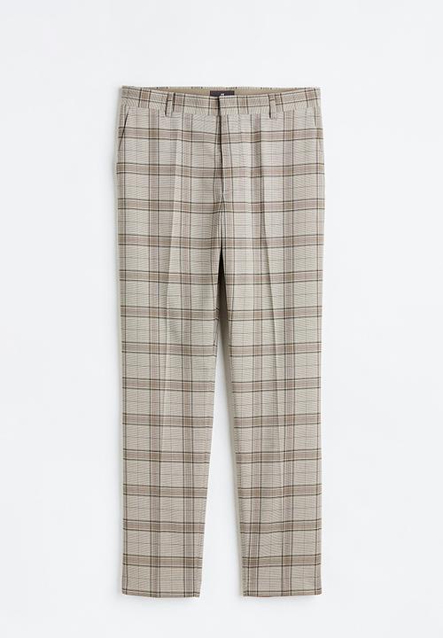 H&M - Slim fit trousers - beige checked 