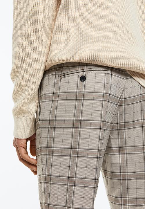 H&M - Slim fit trousers - beige checked 