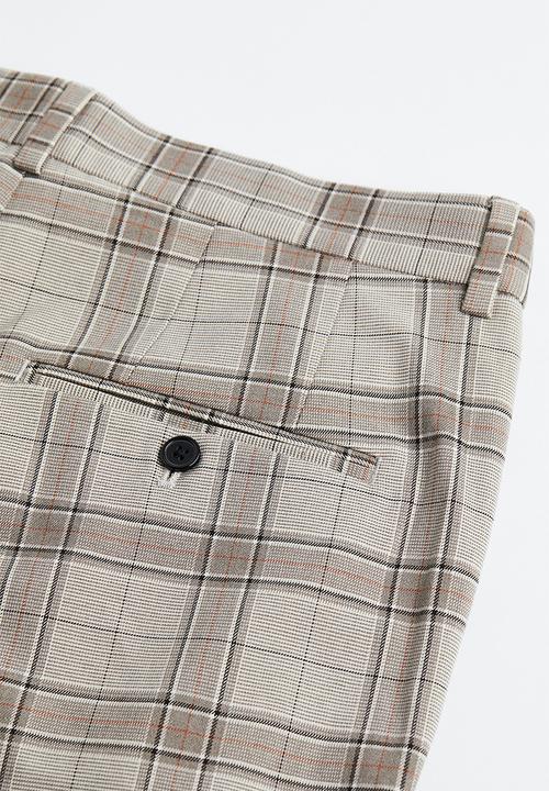 H&M - Slim fit trousers - beige checked 