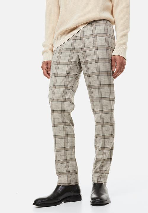 H&M - Slim fit trousers - beige checked 