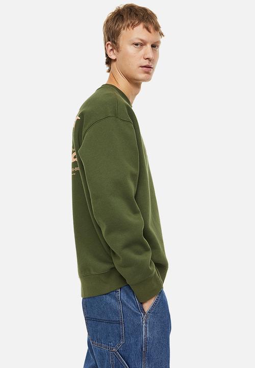 H&M - Relaxed fit printed sweatshirt -  moss green