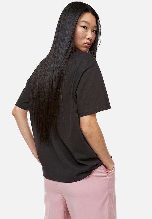 H&M - Oversized printed t-shirt - black/harvard
