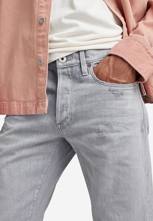 G-STAR - 3301 Slim greystone stretch denim - sun faded ripped skyrocket