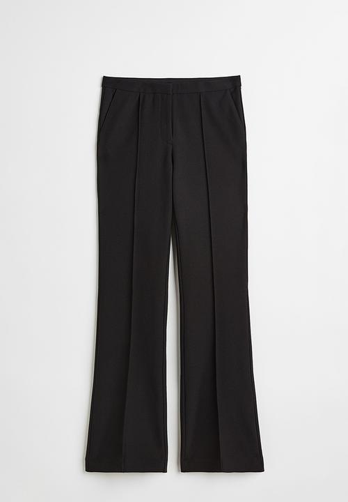 H&M - Flared trousers - black