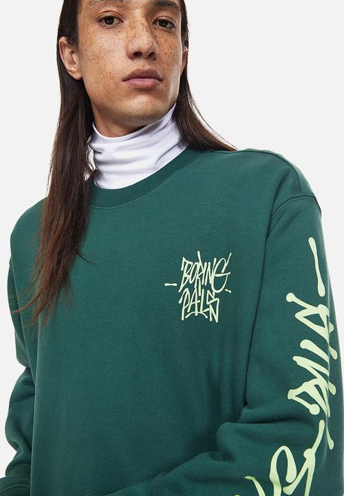 H&M - Oversized fit printed sweatshirt - dark green/boring pals