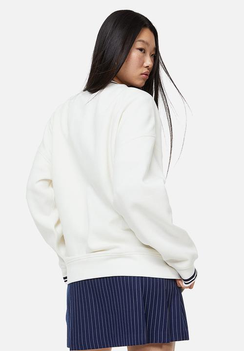 H&M - Oversized printed sweatshirt - cream/yale university