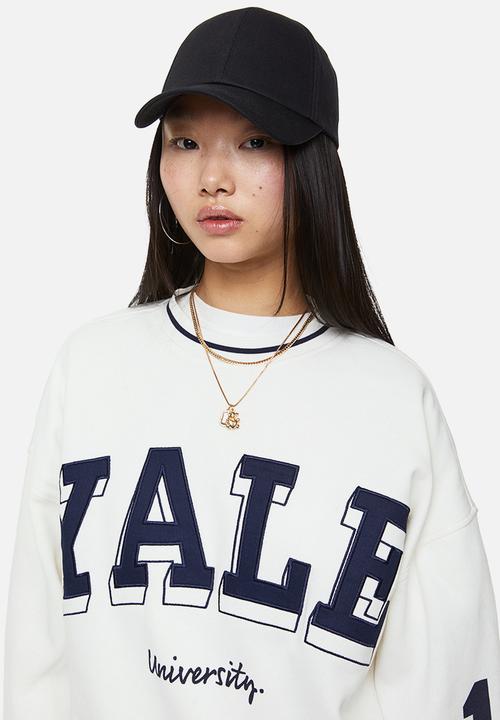 H&M - Oversized printed sweatshirt - cream/yale university