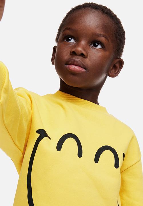 H&M - Printed sweatshirt - yellow smileyworld® 
