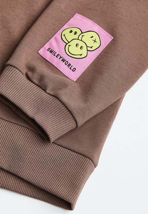 H&M - Oversized printed sweatshirt - cream/smileyworld®