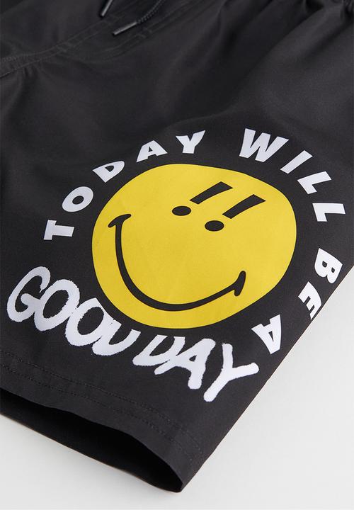 H&M - Printed swim shorts - black/smileyworld® 