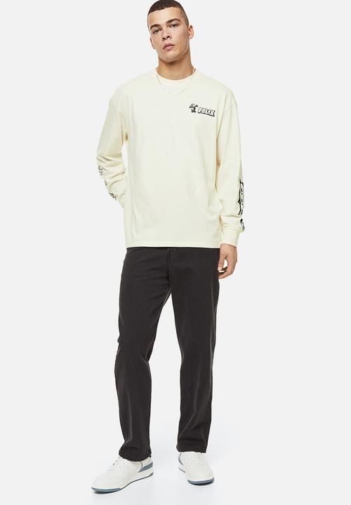 H&M - Relaxed fit printed jersey top - cream/felix the cat