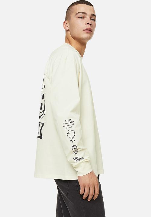 H&M - Relaxed fit printed jersey top - cream/felix the cat