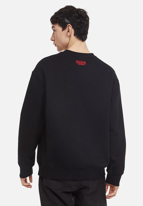 H&M - Relaxed fit sweatshirt - black/stranger things