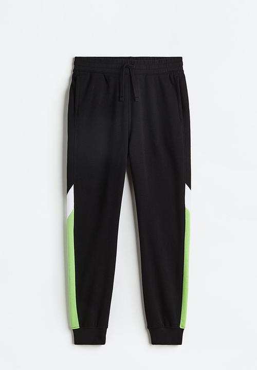 H&M - Sweatpants - black/block-coloured