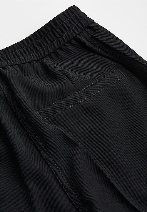 H&M - Straight trousers - black
