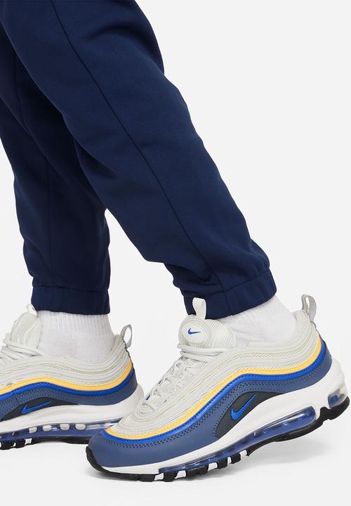 Nike - K nsw tracksuit poly fz hbr - game royal/midnight navy/white