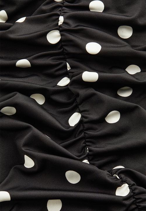 H&M - Gathered bodycon dress - black/spotted 