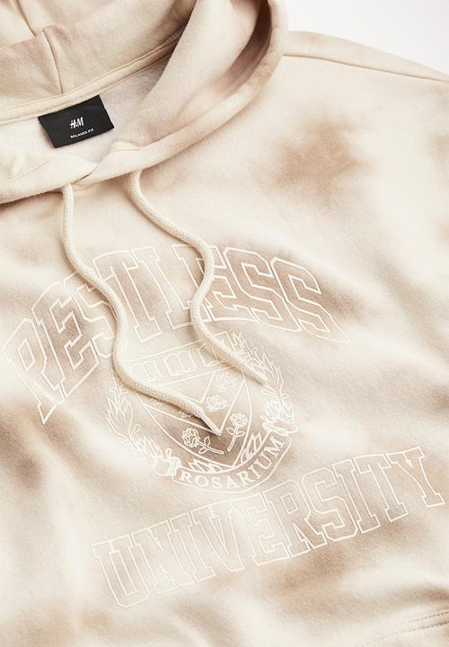 H&M - Relaxed fit printed hoodie - beige/restless university