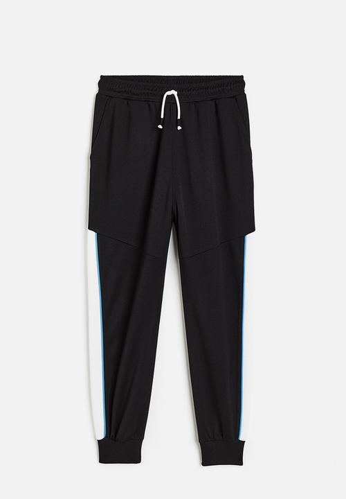 H&M - Track pants - black/block-coloured 