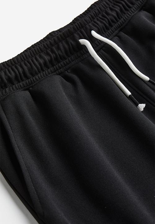 H&M - Track pants - black/block-coloured 