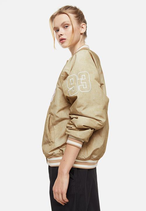 H&M - Embroidered baseball jacket - light beige/players 