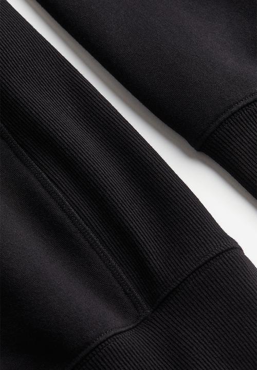 H&M - Loose fit sweatshirt - black/disney100